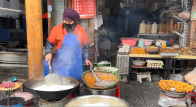 年味渐浓　油炸年货香飘竹山后街